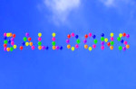 writing in balloons in the sky