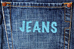 writing embroidered onto jeans